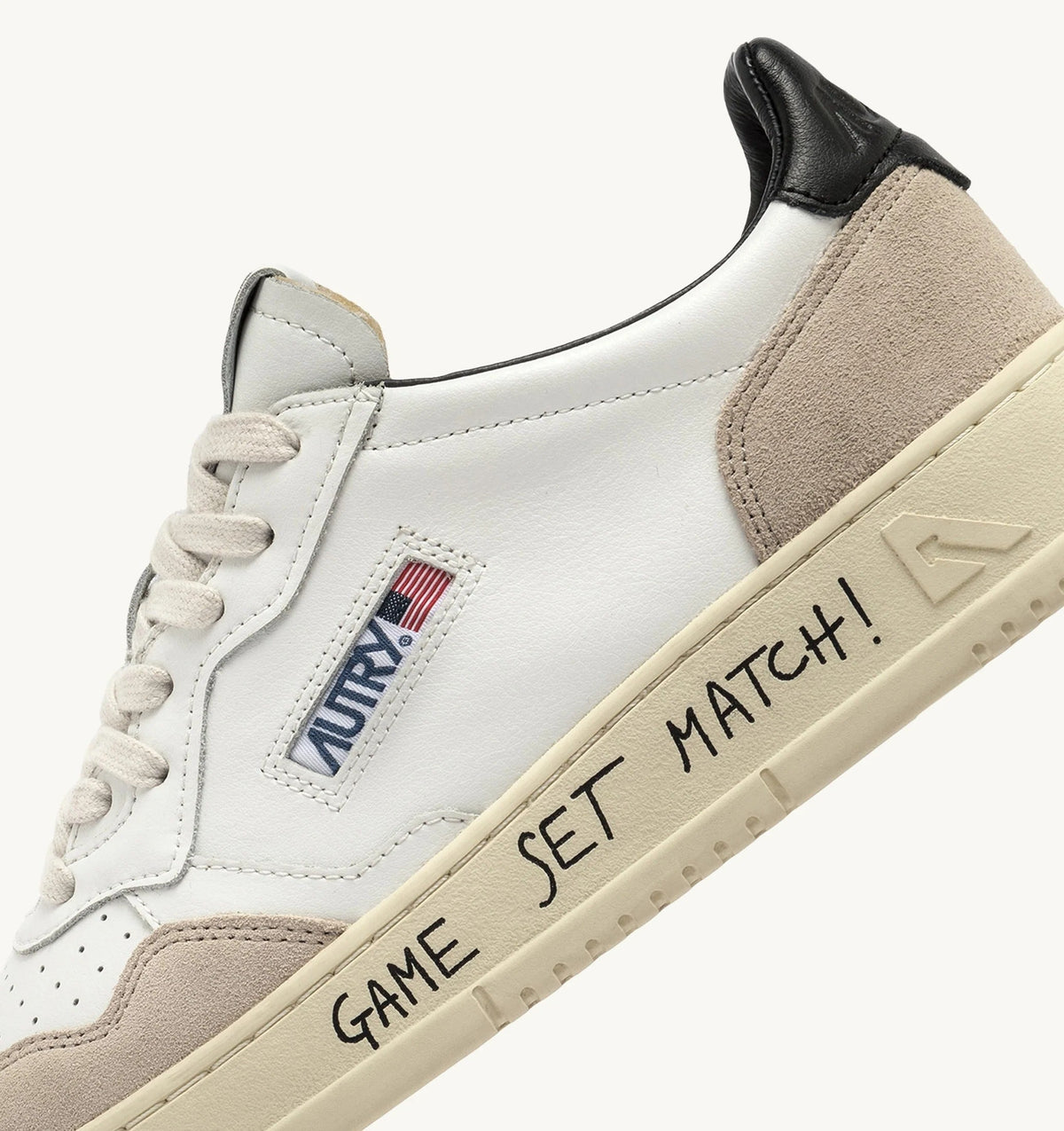 Autry Medalist Low Sneaker – White/Black Leather & Suede with Lettering