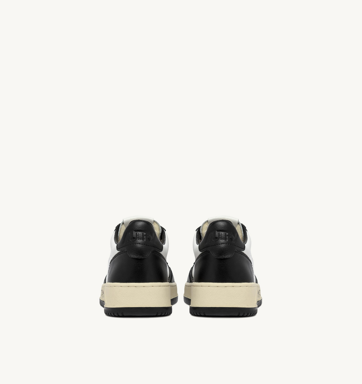 Autry Medalist Low Sneakers In White And Black Leather With Lettering