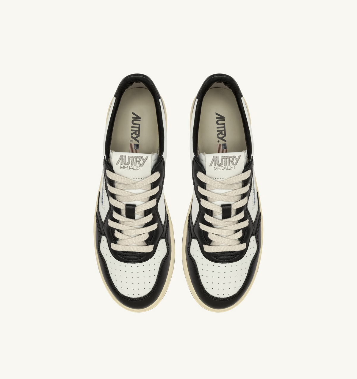 Autry Medalist Low Sneakers In White And Black Leather With Lettering