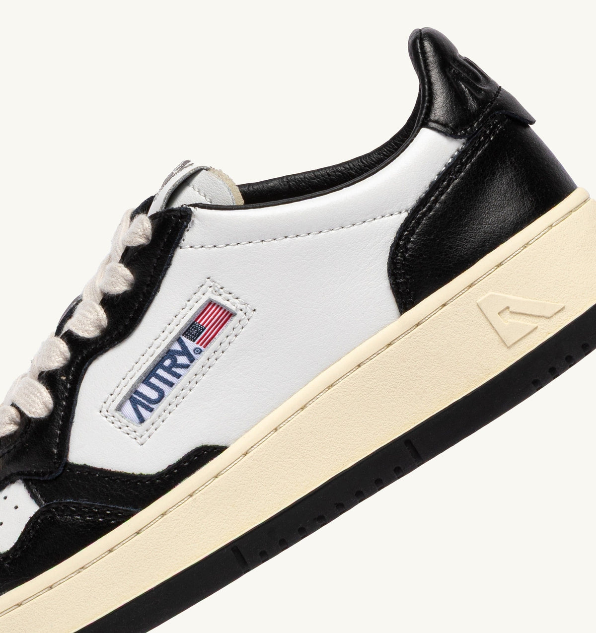Autry Medalist Low Bicolor Sneakers in White and Black Leather