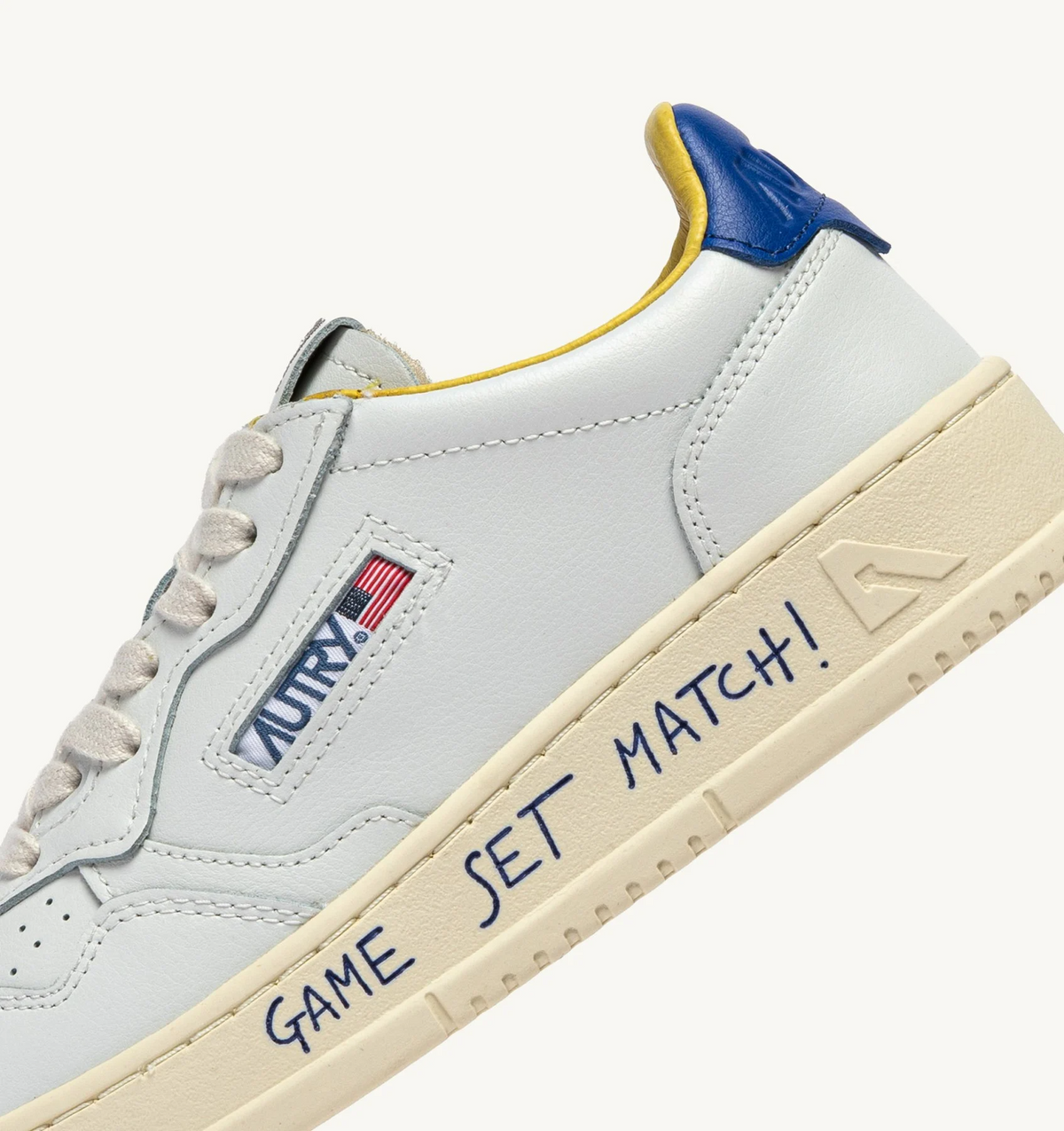 Autry Medalist Low Sneaker – White/Beau Blue Leather with Lettering